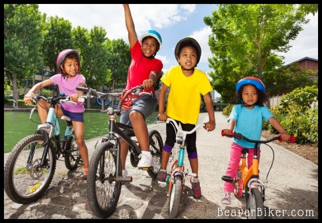 girls and boys biking on the road